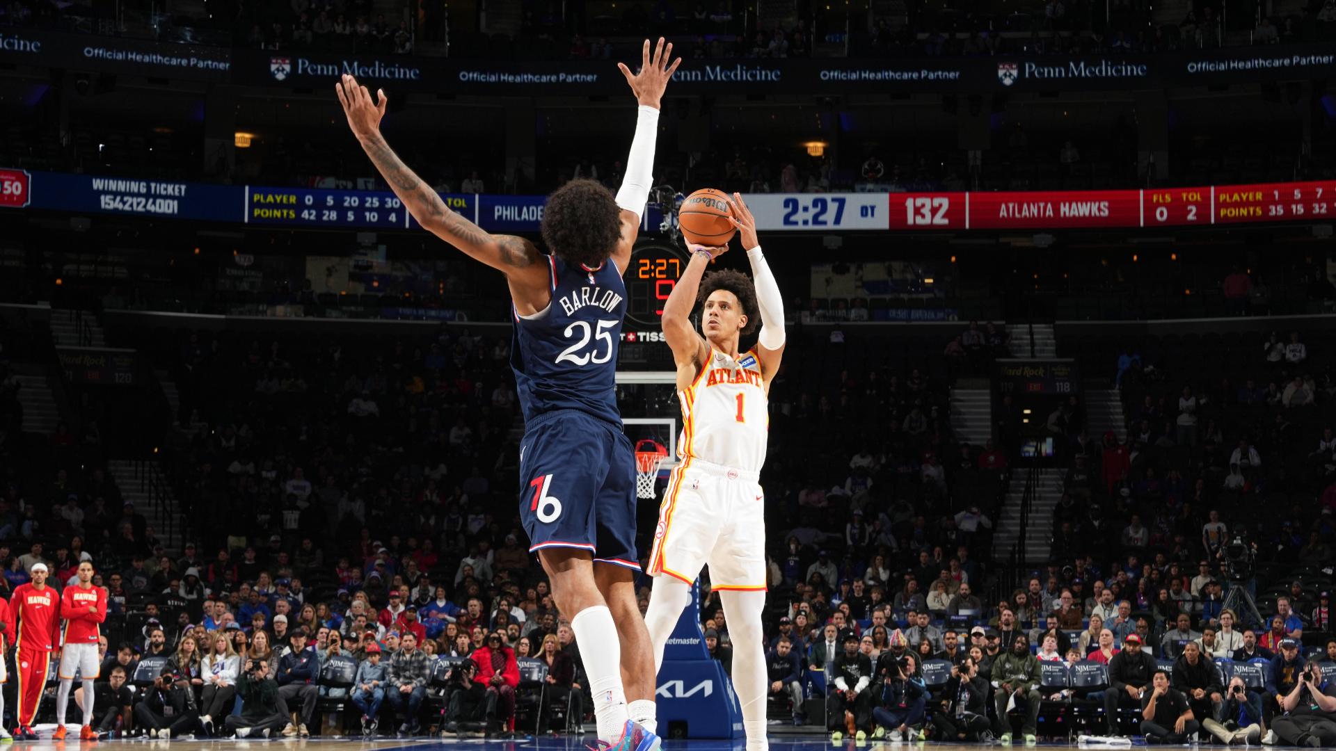 Jalen Johnson gives the Hawks a six-point lead with 3-pointers on back-to-back possessions in double overtime.