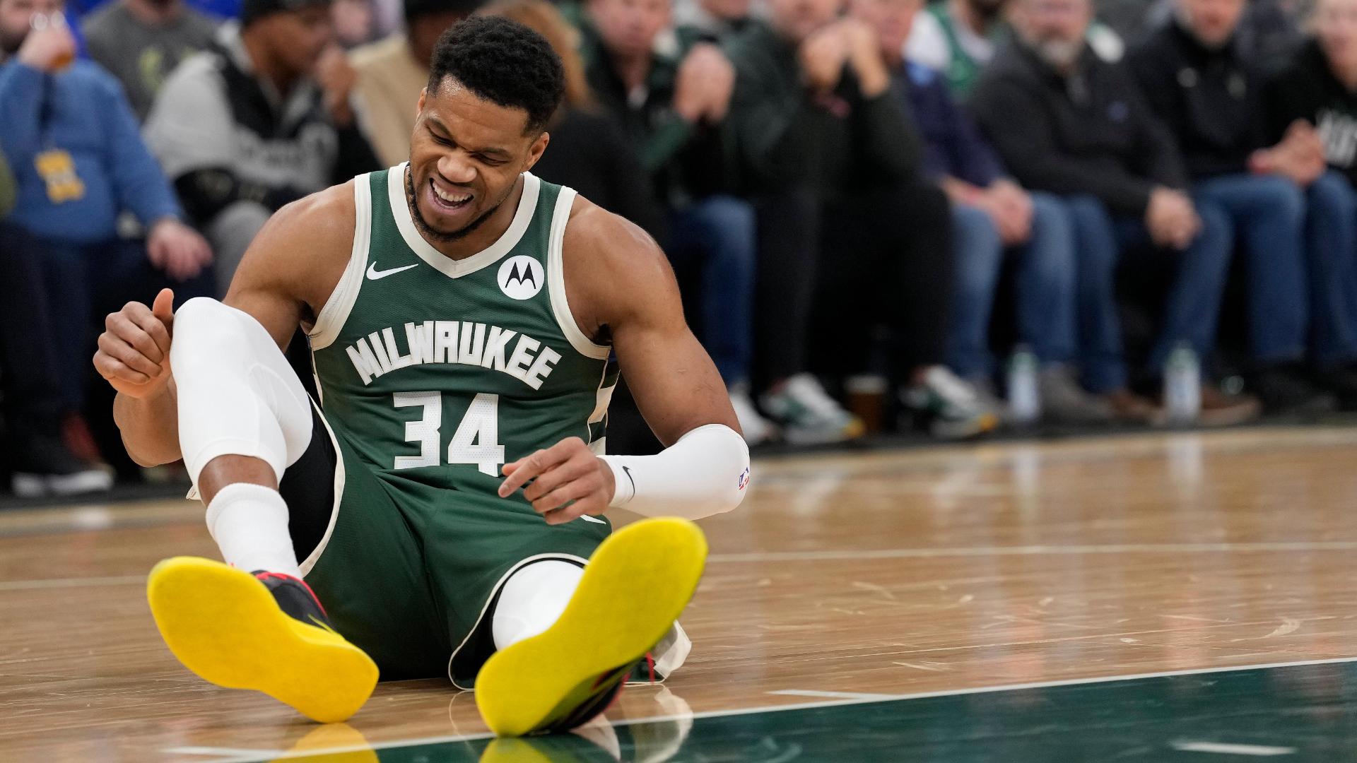 Giannis Antetokounmpo exits the game after appearing to suffer a noncontact injury.