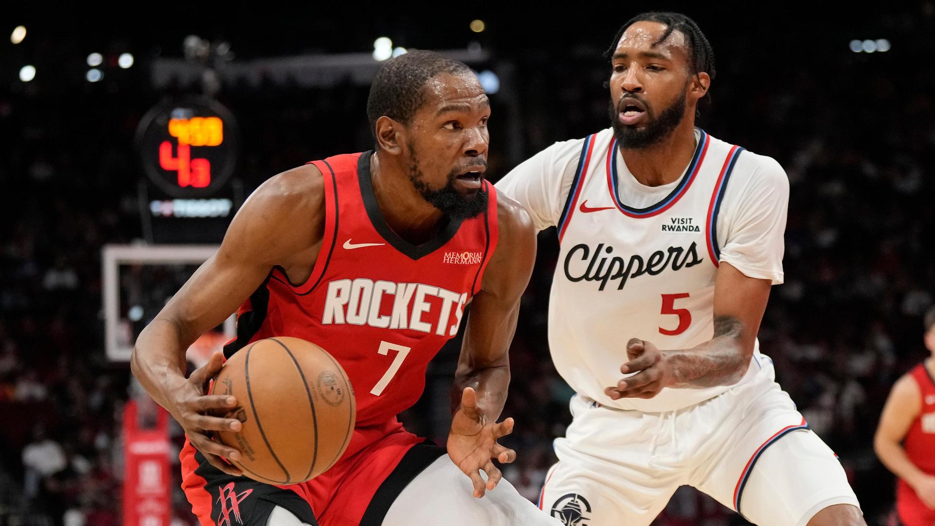 Kevin Durant scores 26 points as the Rockets defeat the Clippers 102-95.
