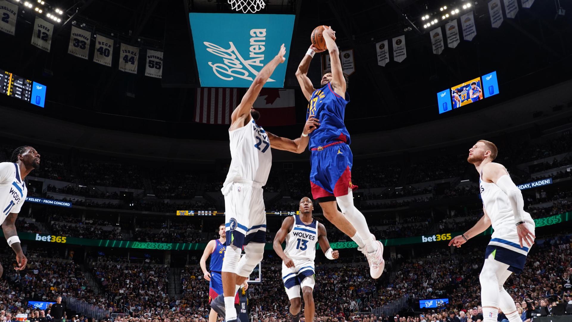 Jamal Murray throws the hammer down over Rudy Gobert for a huge Nuggets dunk vs. the Timberwolves.