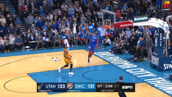 George hammers down highlight-reel windmill dunk