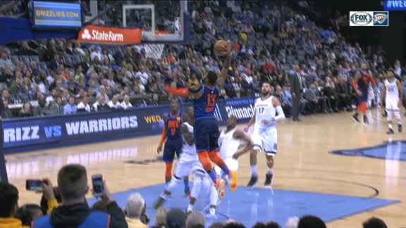 George slams home dunk after long pass from Adams