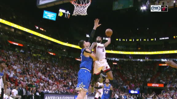 Jones' posterizing slam on Vucevic gets Bosh out of his seat