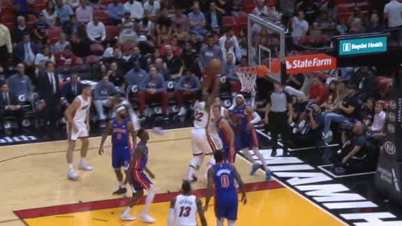 Butler attacks the rim for a slam jam
