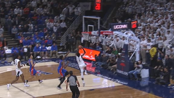 The Huskies crowd erupts as Vital steals and slams