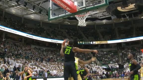 Tillman denies Jones from the basket