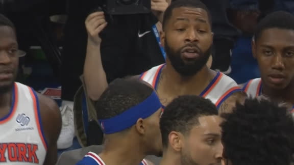 Morris pulls Embiid to the ground, two exchange words