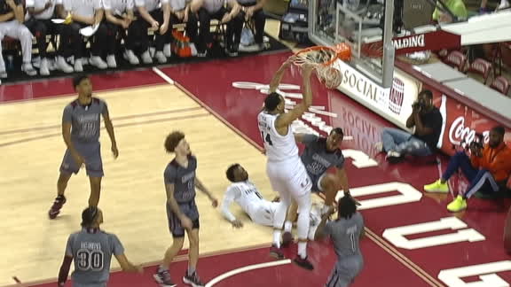 Miami's Miller cleans up the glass with two-handed slam