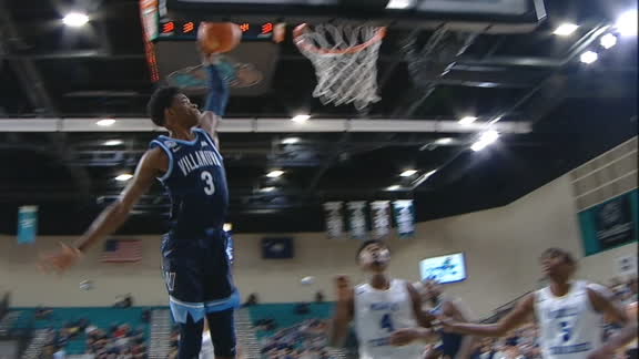 Slater attacks the rim with 1-handed jam