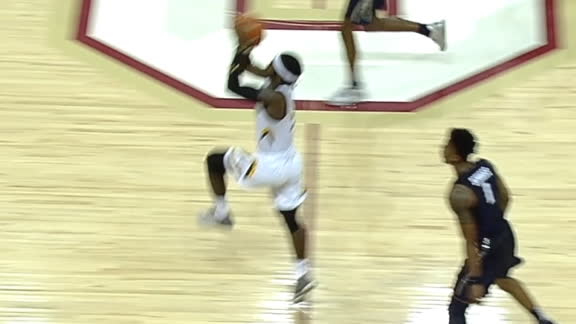 Towson's Dottin nails half-court shot at the buzzer