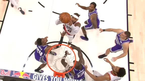 Melo collects 2 offensive rebounds and finishes with bank shot