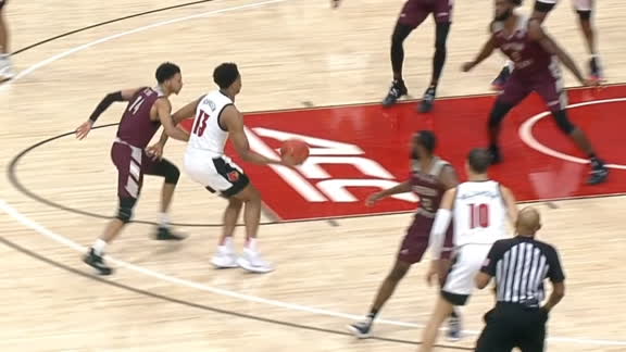 Johnson's no-look dime sets up Louisville triple
