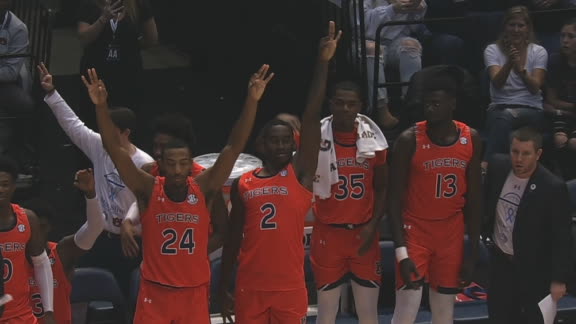 Johnson's 3 gets Auburn's bench on its feet