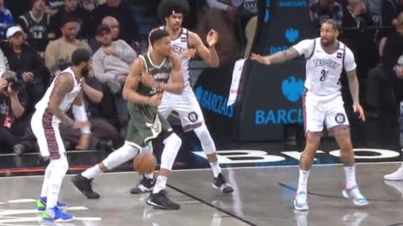 Kyrie strips Giannis then converts a layup