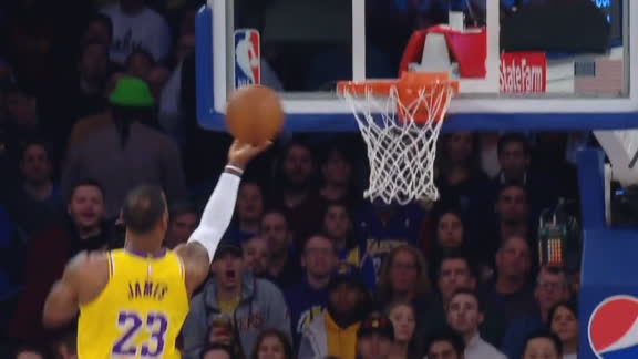 LeBron gets downhill for finger roll and-1