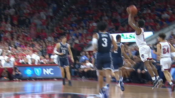 NC State's Johnson opens the bank on half-court buzzer-beater