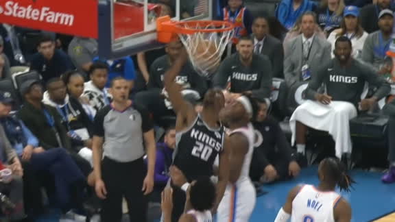 Hield feeds Giles for slam
