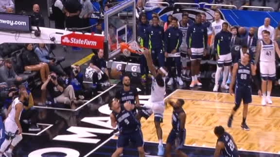McLaughlin's nice pass sets up Johnson for dunk