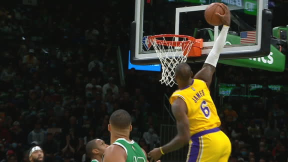 LeBron's first points come in the form of this incredible dunk