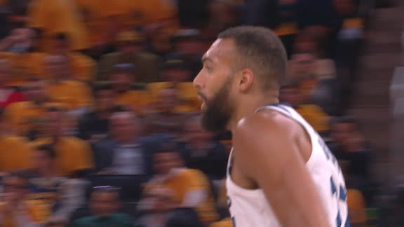 Rudy Gobert gets above the rim and flushes home an alley-oop dunk.