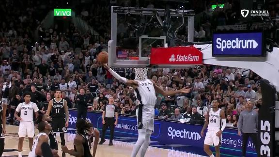 Victor Wembanyama rocks the rim with a powerful flush as he finishes with 31 points in the Spurs' win.