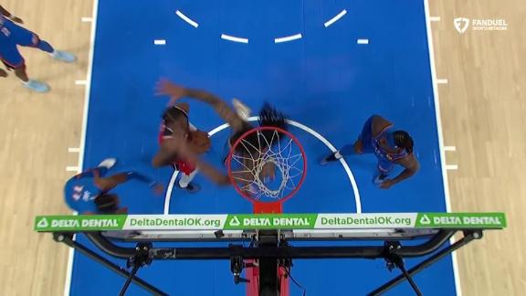 Alex Sarr gets the and-1 to fall