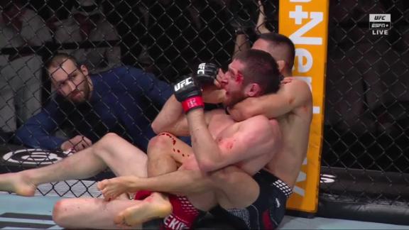 Kyoji Horiguchi locks in a rear naked choke to submit Tagir Ulanbekov