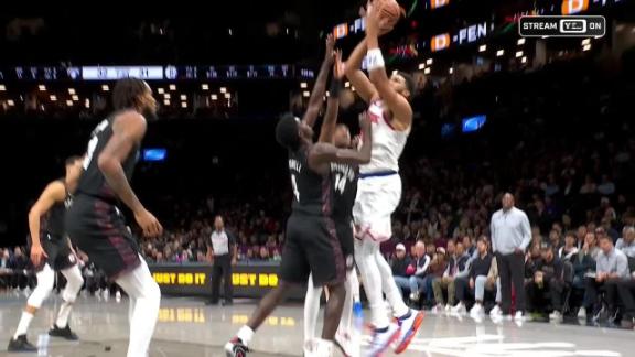 Karl-Anthony Towns fights off defender for and-1