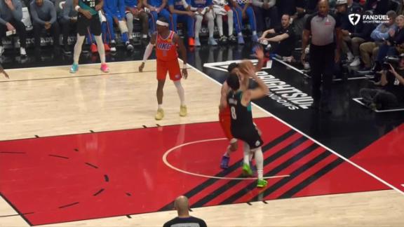 Deni Avdija fearlessly drives to the basket vs. Chet Holmgren plus the foul for the Trail Blazers.