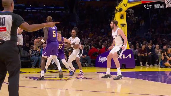 Luka Doncic absorbs the contact and still converts the bucket for the and-1.