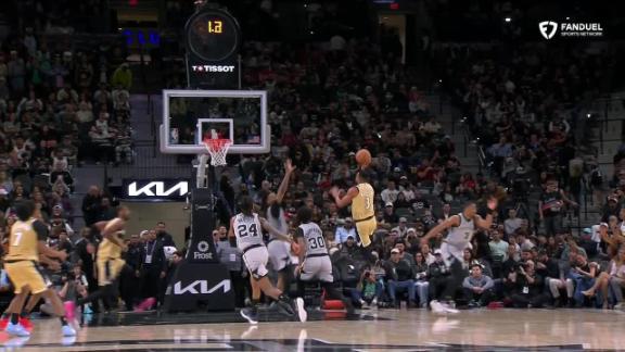 Alex Sarr elevates for alley-oop dunk