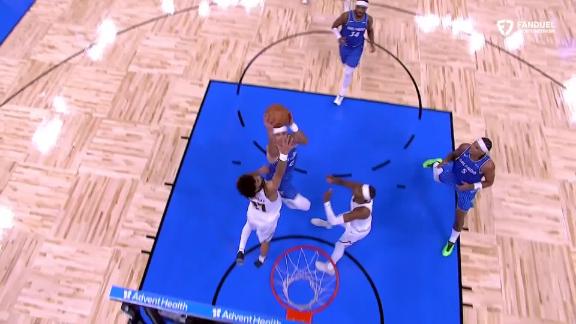 Anthony Black gets the and-1 to fall