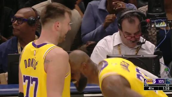 Luka Doncic cashes a wild fadeaway 3-pointer as the shot clock expires.