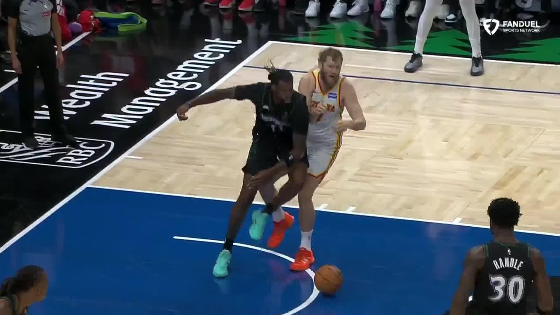 Jaden McDaniels rocks the rim with slam