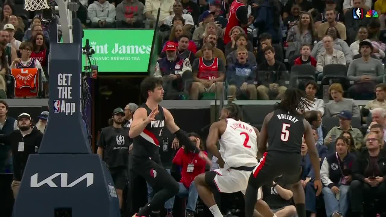 Kawhi Leonard gets the basket plus the foul