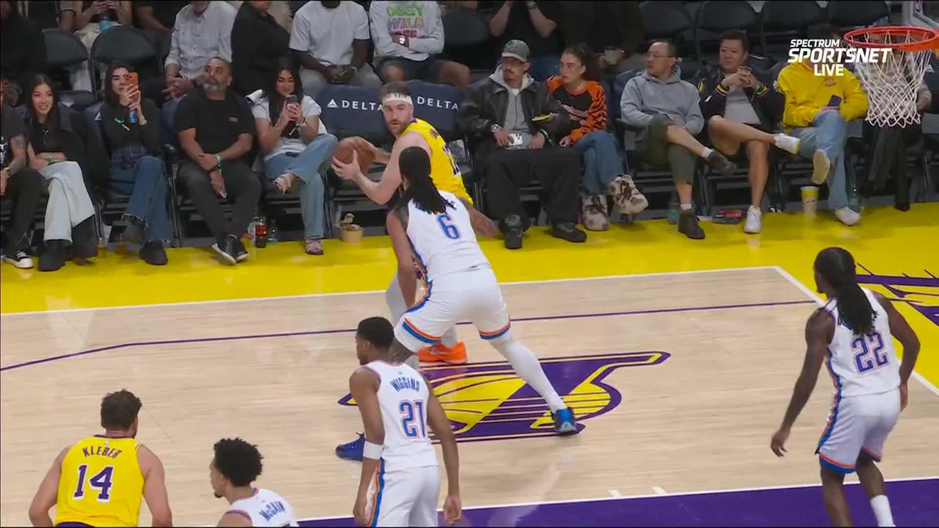 Adou Thiero gets up for the beautiful dunk