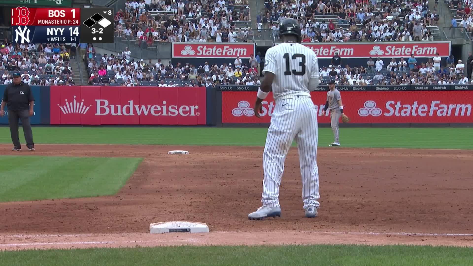 Austin Wells homers twice in 9-run eighth, Heliot Ramos homers in fifth ...