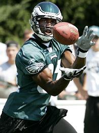 Philadelphia Eagles wide receiver Terrell Owens smiles at the fans