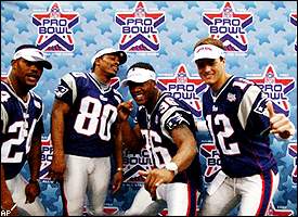 New England Patriots - Willie McGinest hugs his mom after Super Bowl XXXVI