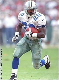 Emmitt Smith of the Dallas Cowboys carries the ball against the