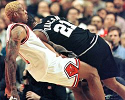 Forward Dennis Rodman of the Los Angeles Lakers looks on during the News  Photo - Getty Images