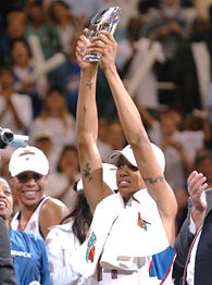 The Detroit Shock pose with their 2006 WNBA Finals trophy after defeating  the Sacramento Monarchs 80-75 in game five of the WNBA Finals at Joe Louis  Arena in Detroit, Michigan on September