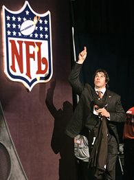 Brady Quinn, a quarterback from Notre Dame, holds a jersey after being  selected 22nd overall by the Cleveland Browns during first round of the NFL  Draft Saturday, April 28, 2007 at Radio