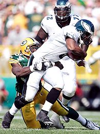 Buffalo Bills' Marshawn Lynch (23) is tackled by Houston Texans' DeMeco  Ryans (59) during the first