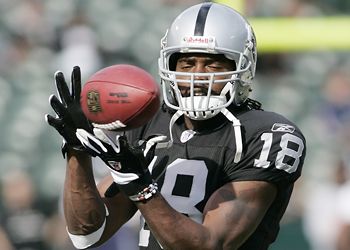 Oakland Raiders wide receiver Randy Moss (18) misses a pass