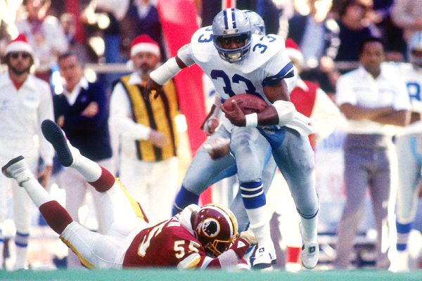 Closeup of Dallas Cowboys Tony Dorsett on sidelines during game vs