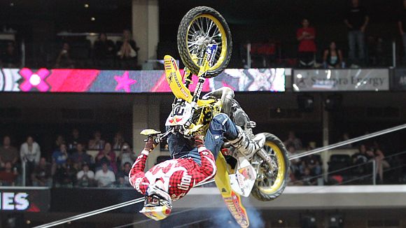 Watch Motocross Pro Travis Pastrana Breaks Down Motocross Stunts