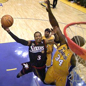 Iverson takes the ball to the hoop