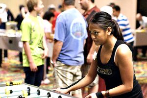 Girls playing foosball