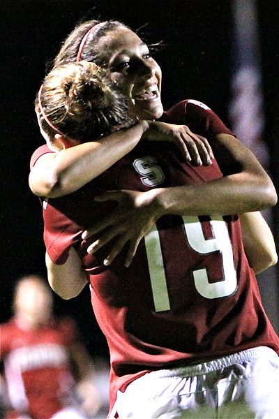 Kelley O'Hara and Christen Press with Stanford Soccer Team